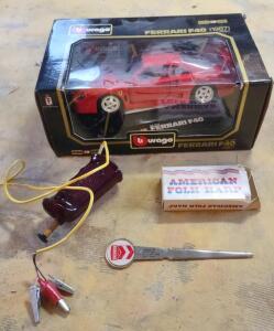(1) Model Car, (1) American Folk Harp, & (1) Vintage Chevron Dealer Mail Opener ( Offsite )