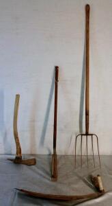 (4) Vintage Hand Tools, (1) Hay Knife, (1) Woodworking Adze, (1) Manual Weed Cutter & (1) Pitchfork