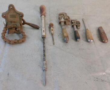 (7} Vintage Hand Tools (1) Hollands Erie USA No. 1 chain pipe vise, (1) Large Ratchet Driver, (1) Small Ratchet Driver, (2) Pipe Wrenches, (1) Screwdriver & (1) Utility Knife