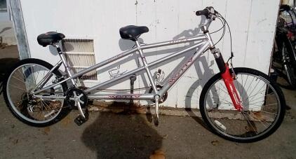 26" Motiv Duet. 18 Speed. Silver & Red. Chain And Brakes Both Need Work.