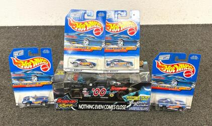 Vintage Hot Wheels Die-Cast Toy Cars From The Race Team Series IV, Released Around 1999.