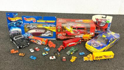 Features A Collection Of Vintage Die-Cast Toy Vehicles, Primarily From The Hot Wheels And Racing Champions Brands