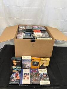 VHS Tapes Collection with Classics like "The Great Gatsby," "Tarzan"