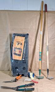 (1) Tool Organizer, (1) Pair Of Hedge Shears, (1) Pair Of Hand Shears, (1) Hand Rake, (1) Flat Hoe & (1) Pointed Hoe