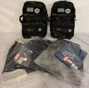 (2) Tactical Backpacks W/ Lunchboxes, (2) Pairs Of Troy Lee Designs Shorts (34), (1) Pair Troy Lee Skyline Pants (31)& (1) Troy Lee Designs Skyline Jersey Indigo (Medium)