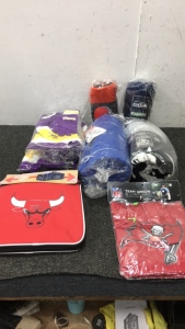 (4) Minnesota Viking scarf sets (1) Chicago bulls 28&rdquo; Duffel Bag (3) NFL Throw blankets (1) Tampa bay buccaneers Chefs Hat