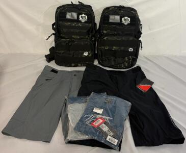 (2) Tactical Backpacks W/ Lunchboxes, (2) Pairs Of Troy Lee Designs Shorts (34 & 32) & (2) Troy Lee Designs Skyline Jersey Indigo (Medium)