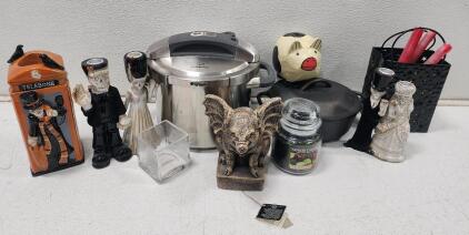 (1) Calphalon 6-Quart Stainless Steel Pressure Cooker (1) Lodge Cast Iron Dutch Oven (1) 1995 Windstone Editions M Pe&ntilde;a Gargoyle Pig And More