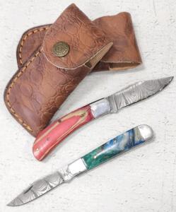 (2) Damascus Steel Pocket Knives With Wood And Resin Handles And Sheaths