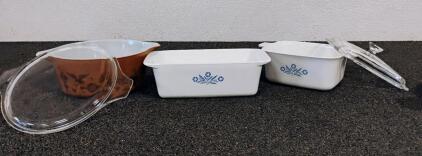 (1) Pyrex corning Ware 9x5x3 2 Qt, (1) Pyrex 2 1/2 Qt. Baking dish with lid, (1) 7x5 1/2x3 baking dish with lid