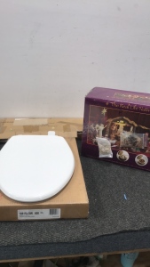 (1) The Real Life Nativity Set (1) Wheelchair Assisting Ramp (1) Elongated Plastic Toilet Seat