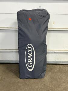Graco Pack 'n Play Portable Playard Gray Houndstooth, Wheels, Carry Bag, 2 Plush Toys, Tear Mesh