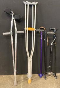 (2) Pairs Of Crutches, And (4) Canes