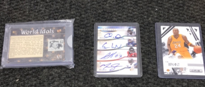 (1) Henry Ford World Icons Stamp/Newspaper Card 1/1 (1) NFL 2009 Sp Signature Quad Autographed Card (1) 2009 Rookies and Stars Kobe Bryant Card