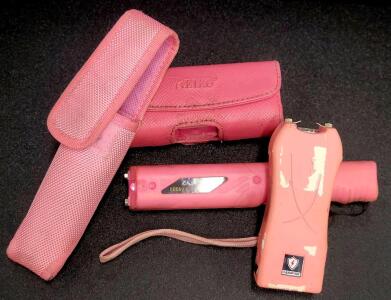 (2) Pink Tasers (1) Keiko Brand Taser & (1) ZapStick Stun Gun.