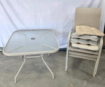 Beige Outdoor Patio Table and Chair Set, 4 Stacking Chairs, Glass Top, Cushion Included