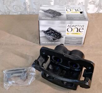 (1) 2452XA - NAPA Adaptive One Brake Caliper - Dual Piston Floating - Remanufactured, For Multiple GMC, Chevy & Cadillac Vehicles