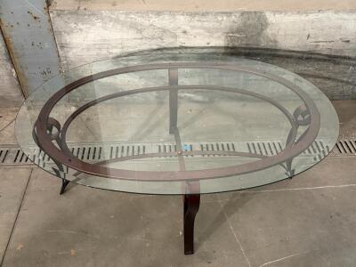 Contemporary Oval Glass Coffee Table with Metal Scrollwork Base, 50"x30", Tempered Glass Top