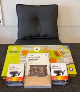 (1) Set Of Outdoor Seat Cushions, (1) Wall Game Crocodile, (2) Mini Heaters, And More!!