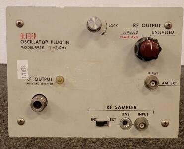 The Alfred Oscillator Model 651K covers the 1 to 2 GHz is a vintage microwave oscillator plug-in module designed for use with the Alfred Model 650 sweep oscillator mainframes. This equipment was typically used in microwave testing and laboratory environme
