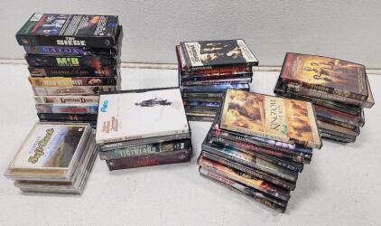(52) Assorted Movie DVDs, VHS Tapes, And CDs Includes The Matrix, MIB, The Mummy And More