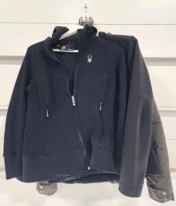 (1) Obermeyer Women's Leighton Insulated Ski Jacket Size W10 (1) The North Face Apex Bionic Soft Shell Jacket Size M (1) Spyder Women's Ardent Full Zip Hoody Mid-Weight Sweater Size L W/ Garment Bag