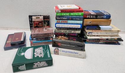 (22) Assorted Hardcover And Paperback Books (5) Assorted Movie DVDs (3) Assorted VHS Tapes And More