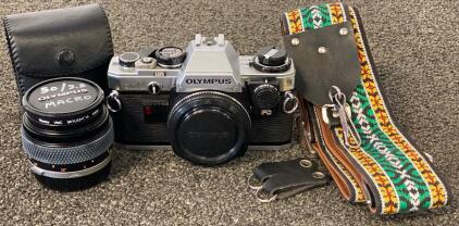 Olympus OM-10 35mm SLR Camera, Zuiko 50mm f/3.5 Macro Lens, Olympus Flash, Strap, Accessories