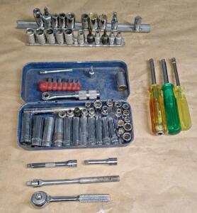 (1) 1/4" Drive Ratchet, (1) 1/4" Drive Breaker Bar, (2) Extensions, Assorted Sockets & (3) 1/4" Bit Drivers