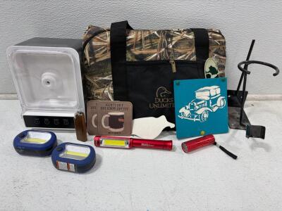 Steel Wall-Mount Utility Bracket, Black, 8"x3"x8". Ducks unlimited duffle bag, pet cat water fountain with lid(powers on). 4 lights, coasters, sticker, classic car art.