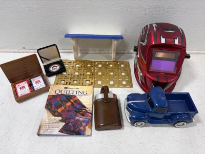 Ford 1940 Pickup Collectible Blue Ceramic Truck by Tinsan, Licensed Ford Product, 7.5&rdquo;. Welding helmet, quilting book, small shelf, flask, playing cards.