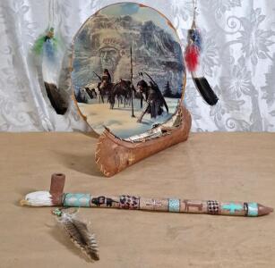 (1) Decorative Oval Wall Plaque "Indian Trackers in Snow", 16"W x 19"T, (1) Model Birch Canoe, 18"L & (1) Decrotive Peace Pipe, 22"L, Resin