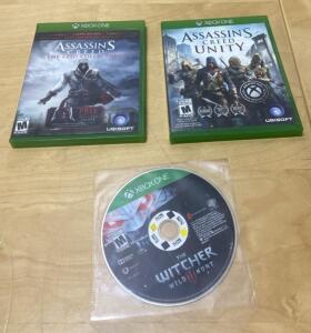 Xbox One Assassin's Creed Ezio Collection, Unity, Witcher 3 Wild Hunt Bundle, 2 cases, 3 games