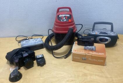 Cannon Powershot A530 and Meikai Camera - Shop Vac - Cd Player and Alarm Clock - ( All Power On )
