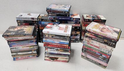 (42) Assorted Movie VHS Tapes (63) Assorted Movie DVDs Includes IT, Independence Day, Casablanca, And More
