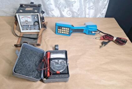 (1) Triplett Model 310 Analog Multi-Meter, (1) Vintage PR25A Canoga-Perkins Tagger Analyzer, & (1) Harris TS22 Linemans Test Set