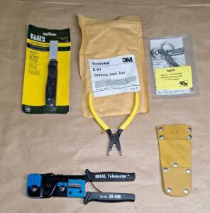 (1) Ideal Telemaster Crimp Tool, (1) Cable Splicing Knife, (1) E-9Y Stepped Jaws Tool, (1) Pair Of Electrican Scissors & (1) Leather Tool Sheath