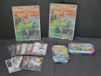 (1) Pok&eacute;mon Trading Card Game Collector Tin w/ Assorted Dragon Ball Cards (~40ea) & (2) Victini Jumbo Cards w/ Full Art.