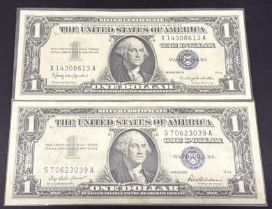 (2) 1957 Series $1 Silver Certificates, Blue Seal, George Washington, Serial S70623039A & X14308613A