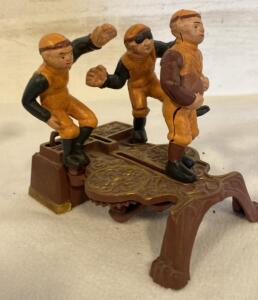Cast Iron Mechanical Football Bank, 3 Player Design, Orange Uniforms, Vintage Repro Style, C. 1970s-90s
