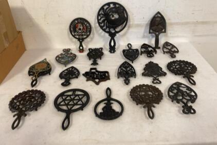 Lot of 18 Antique Cast Iron Trivets, Ornate Patterns, Mixed Motifs, Circa 1920s&ndash;1950s