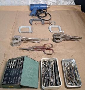 (1) Heat Gun, (3) C-Clamps, (2) Pair Of Vive Grip Clamp Pliers, (1l Pait Of Tin Snips & Assorted Drill Bits