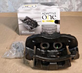 (1) 2462XB - NAPA Adaptive One Brake Caliper - Dual Piston Floating - Remanufactured, Rear Left For Multiple Ford Models