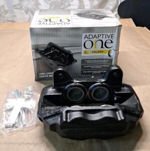 (1) 1471XB - NAPA Adaptive One Brake Caliper - 4-Piston Fixed - Remanufactured, Front Left, For 1996-1997 Lexus LX450