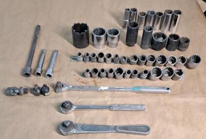 (2) 1/2" Drive Ratchets, (1) 1/2" Drive Breaker Bar & Assorted Extensions, Adapters & Sockets