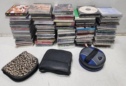 (50+) Assorted CD And Movie DVDs Includes Phantom Of The Opera, Mulan Rouge, A Very Larry Christmas, And More