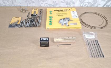 (1) Wixey WR365 Digital Angle Guage & Level, (1) 6" Deulen Joiner/Planner/Knife Sharpner Jig, (1) Pack Of Assorted Scroll Saw Blades, (2) 80" Bandsaw Blades & Assorted Drill Bits
