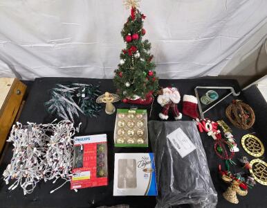 Christmas items <br/>(4) Wine glass set (New)<br/>Gold tree ordiments <br/>Phillips Led lighted ordiments (Inside/Out doors)<br/>(ALL LIGHT TESTED)<br/>CHRISTMAS TREE IN Santa's boot<br/>Gmc grill winter cover (2002)