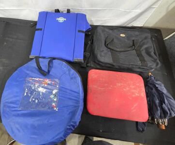 Travel bag(Black)<br/>Umbrella (Blue) (fold up)<br/>Crazy creek chair<br/>Knee pad with wheels <br/>Trash can (foldUp in bag)<br/><br/>