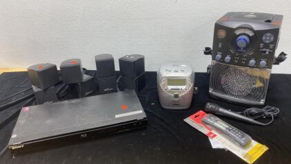 Karaoke Machine (Powers On) - Paramax Speakers (4) - Philips CD Player (Powers On) - Sony Blueray (Unable to Test)